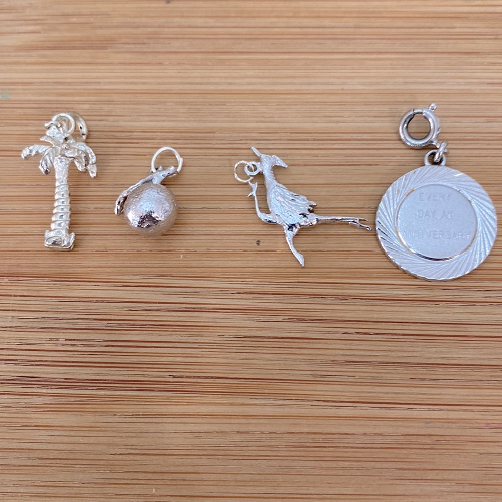 4 vintage charms. Palm tree, apple, Road runner bird, anniversary (Monet).